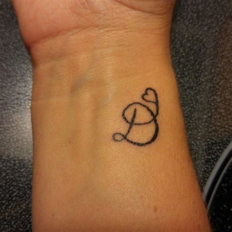 Letter D in heart tattoo made by me at the Black Box