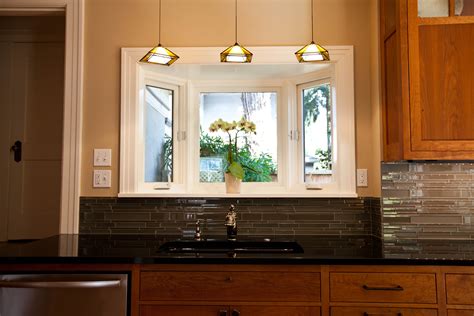 Christopher Architecture & Interiors kitchen lighting over the sink lighting large kitchen