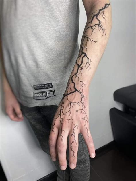 Lightning Hand Tattoo