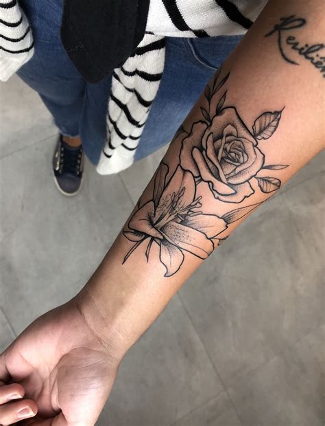 Lily and roses rib tattoo. Thank u Heather! Rib tattoo