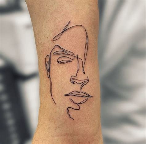 Line Face Tattoo