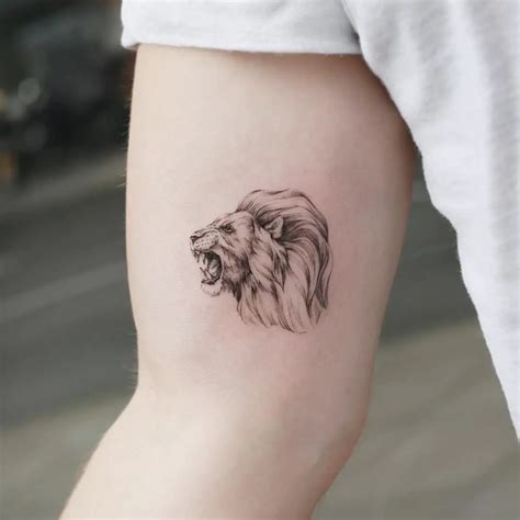 Tiny lion tattoo idea by goldy_z Lion head tattoos