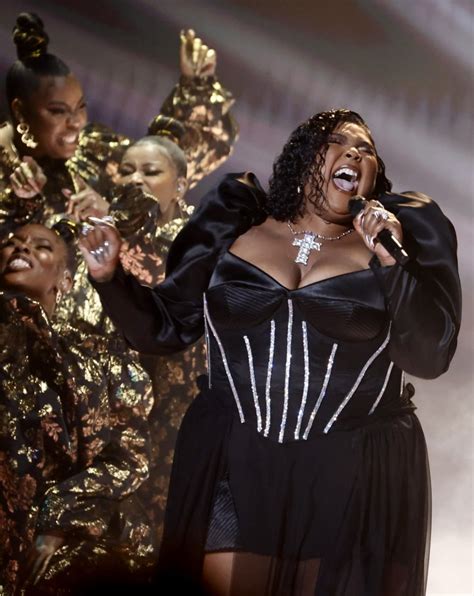 Lizzo performing on stage