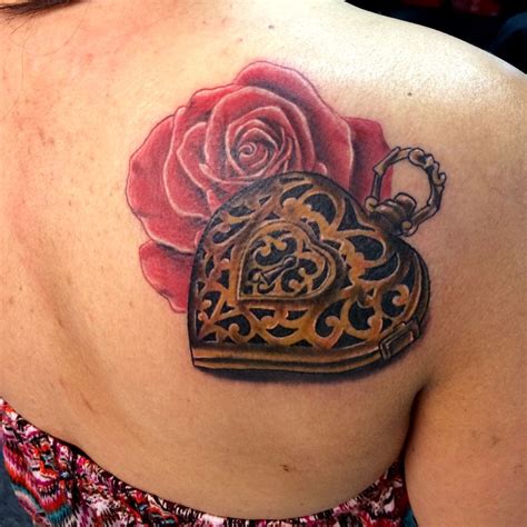 Locket rose tattoo by Basia. Limited availability at