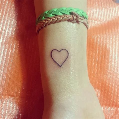 Heart Tattoos on Wrist Designs, Ideas and Meaning