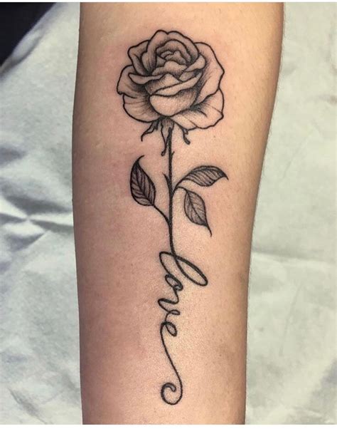 Amor completo love) Rose tattoo. Script forearm