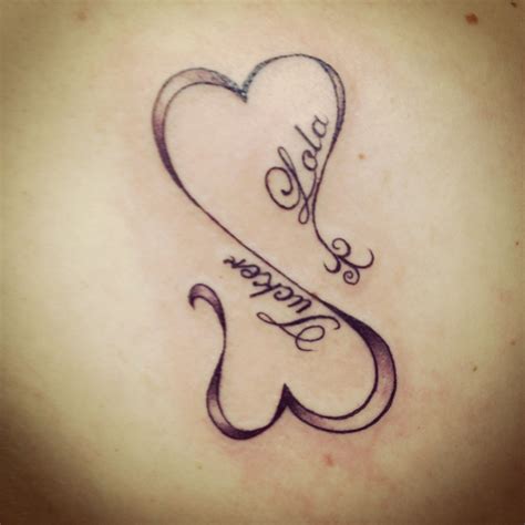 My first tattoo,my children's names!!Love this!!! (con