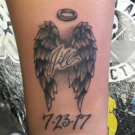 Loving Memory Remembrance Angel Wings Tattoo On Wrist