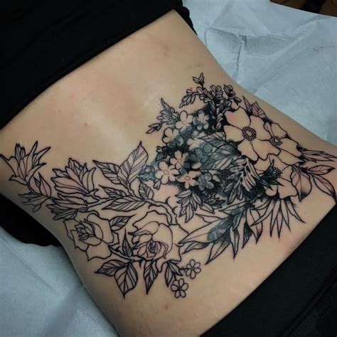 Lower Back Flower Tattoos