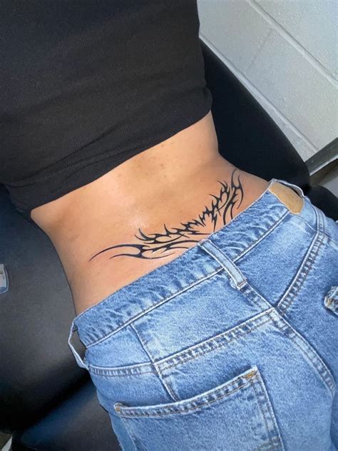 Lower Back Tattoos For Females