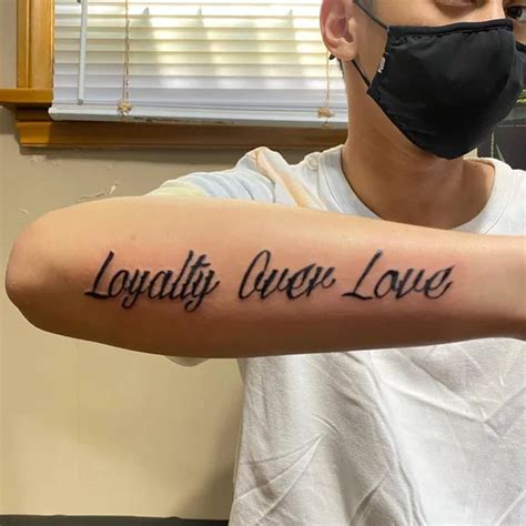 Loyalty Over Love Tattoo
