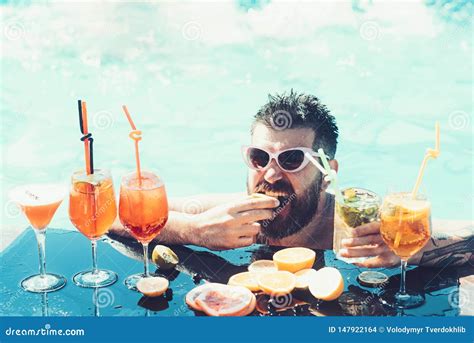 Man Drinking Cocktail