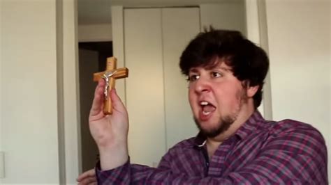 Man Holding Cross Meme