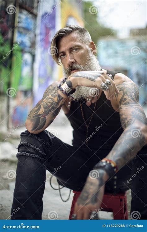 Man With Beard And Tattoos