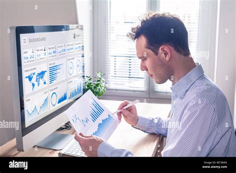 Marketing Manager Analyzing Data