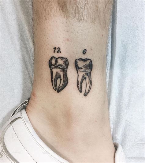 Meaning Of Tooth Tattoo