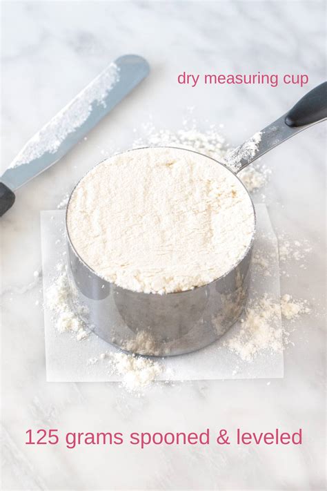 Image of a measuring cup with flour