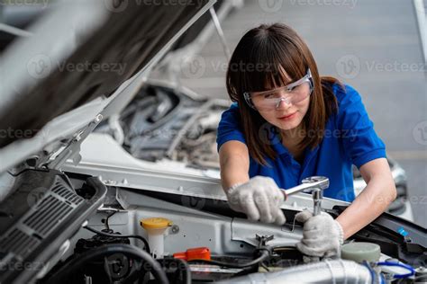 Mechanic checking car engine Tacoma WA