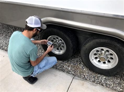 Mechanic inspecting RV tires