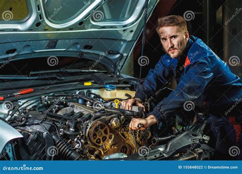 Mechanic working on car