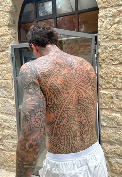 Unleashing Masculinity: Discovering the Intricate Art of Men's Back Tattoos