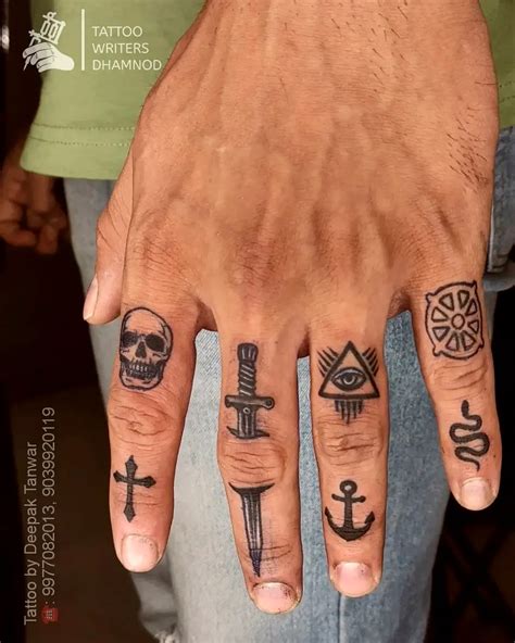 Men Finger Tattoos