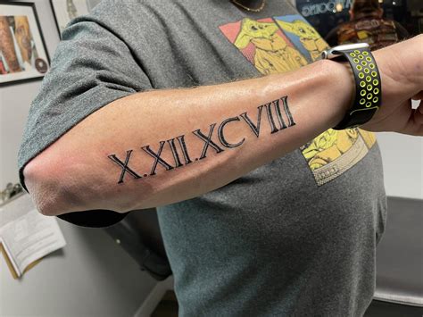 Men Roman Numeral Tattoos