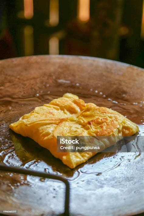 Menggoreng Roti Gepeng
