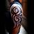 Mens Upper Arm Tribal Tattoos