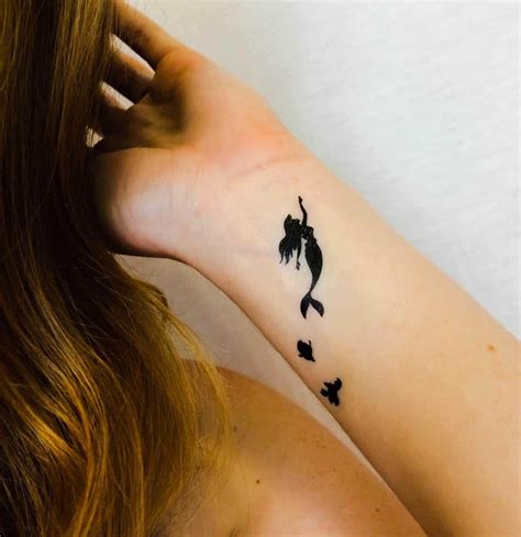 Mermaid tattoo on wrist by Audrey Mello (With images