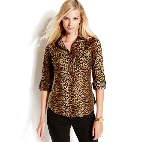 Roar into Style with Michael Kors' Chic Animal Print Tops - Shop Now!