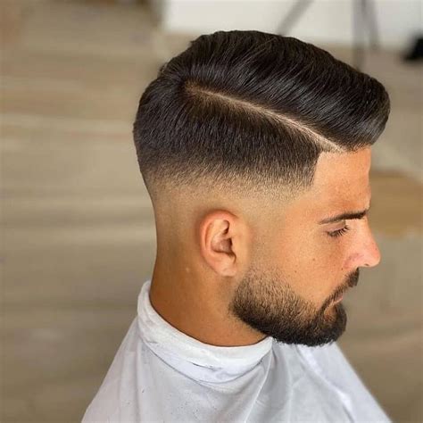 Mid Fade with a Side Part