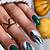Midnight Magic: Embrace the magic of the night with dark green fall nail designs
