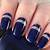 Midnight Romance: Fall in Love with Dark Blue Nail Colors That Sparkle and Shine