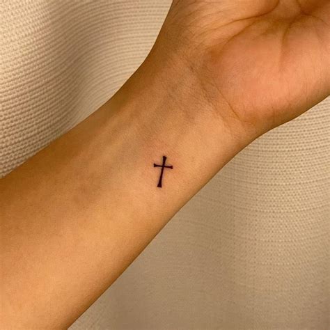 Minimalist Cross Tattoo