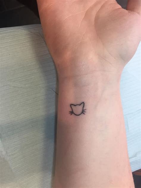 Minimalist Small Cat Tattoo
