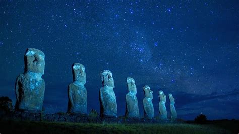 Moai statues at night