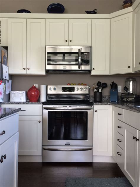 Modern White Kitchen with Stainless Steel Appliances HGTV