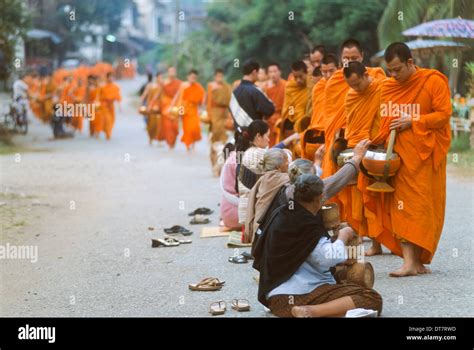 Monks receiving alms