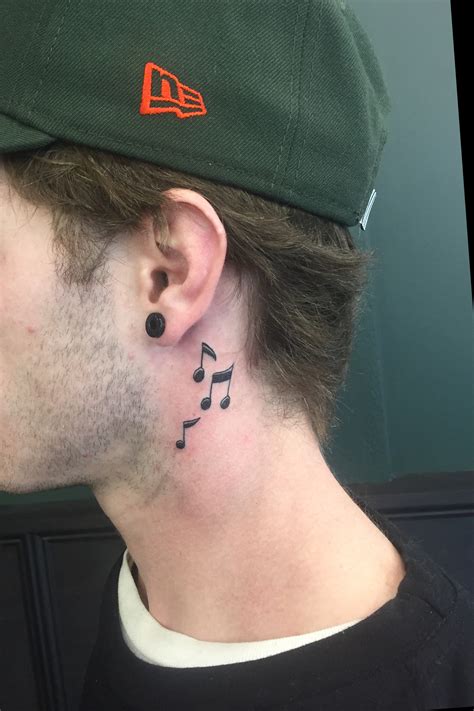 Music Note Tattoo On Ear