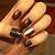 Mysterious Allure: Discover the Magic of Dark Brown Nail Art!