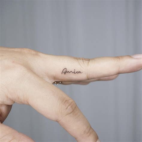 Name In Finger Tattoo