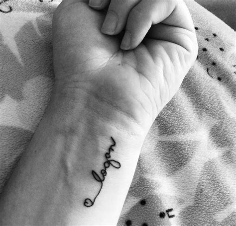 Daughters name tattoo on left wrist Name tattoos on