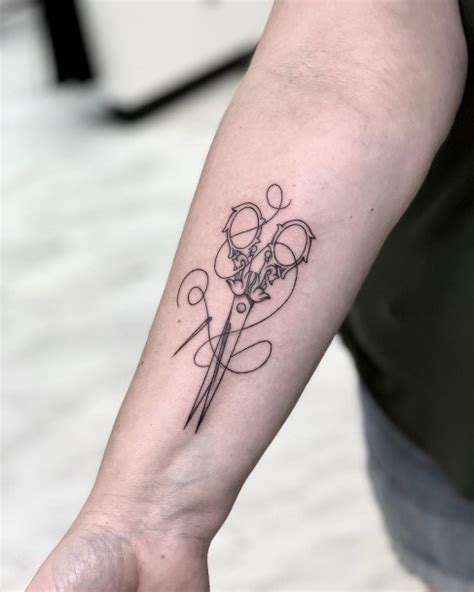 Needle And Thread Tattoo