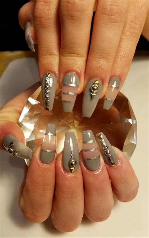 Negative Space Intrigue nail art on coffin nails