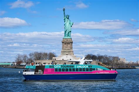 People on a boat tour of New York City's skyline