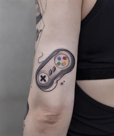 NES Controller tattoo by Jake Betts Nintendo tattoo