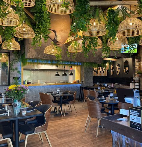 Indulge in the Latin-inspired Cuisine and Chic Ambiance at Oasis Kitchen Lounge Ave Maria - Your Ultimate Culinary Destination!