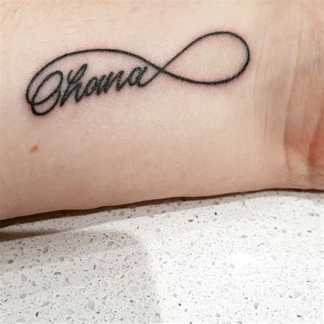 Wrist tattoos, ohana, infinity sign, faith, hope and love