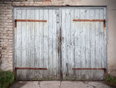 Is It Possible to Refurbish an Old Garage Door Into a New One